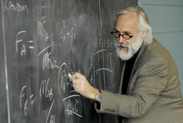 teachers writing on blackboard