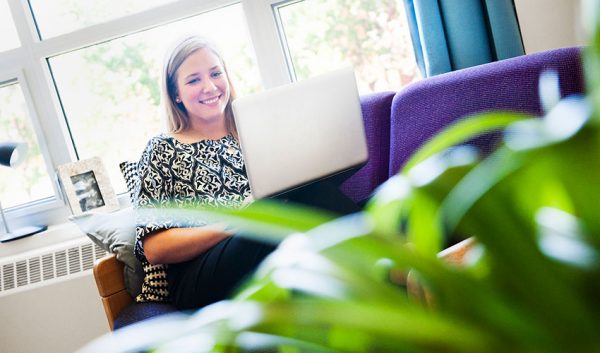Student enjoying quiet study time on campus.