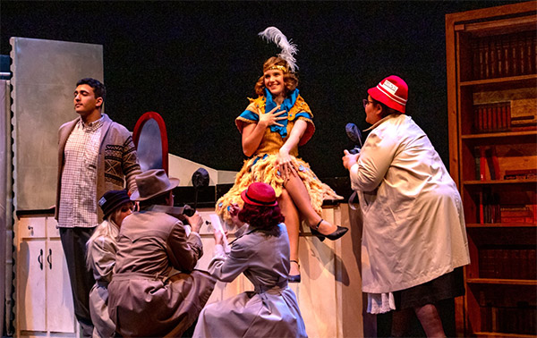 Students on stage during one of our production.