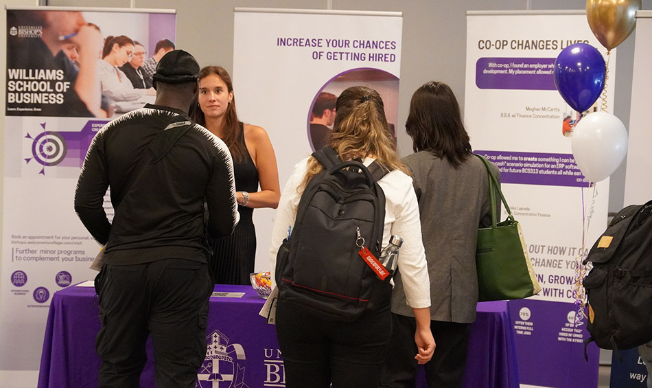 Students meeting with potential employers at the BIZTEC Career Recruitment event.