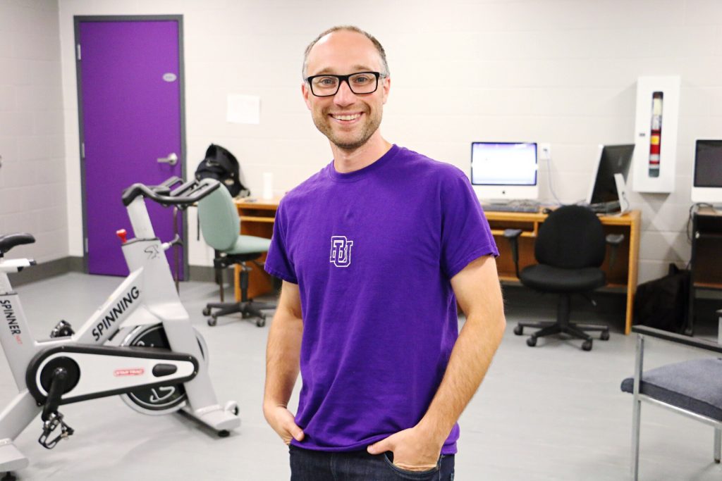 Dr. Maxime Trempe, smiling at the camera in a lab.