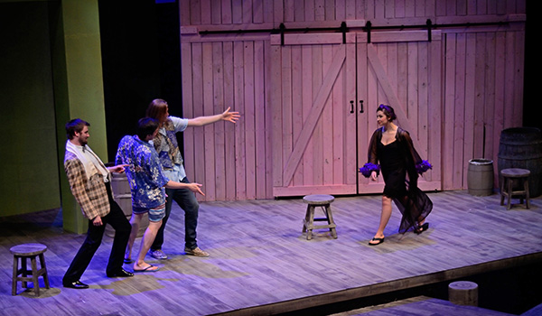 Students acting on stage