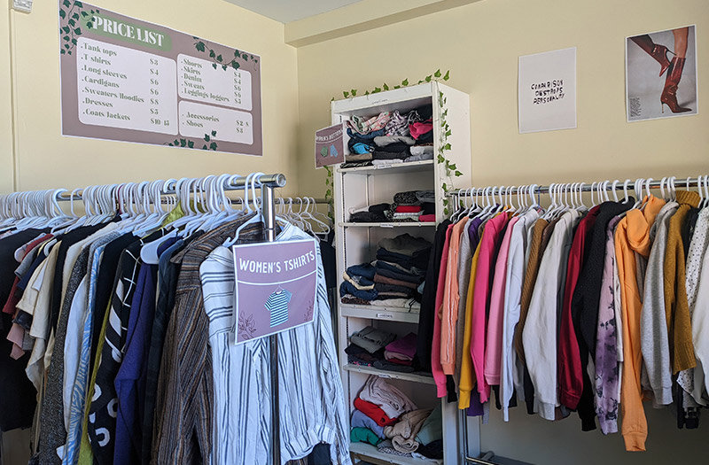 Clothes racks showing women's clothes
