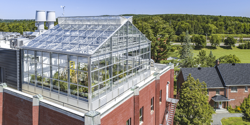 Drone shot of the greenhouse which sits atop the Johnson building on the Bishop's campus.