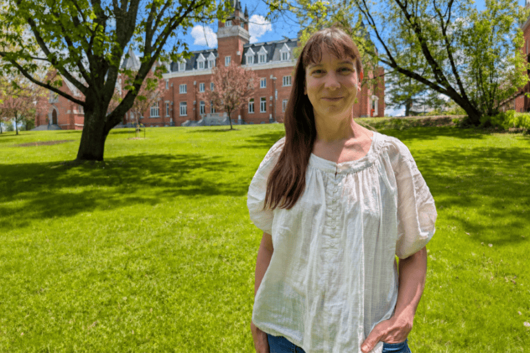 A photo of Vicki Chartrand outside of McGreer Hall.