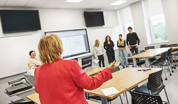 A School of Education professor during a Research presentation.