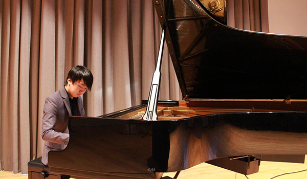 Music student at the piano
