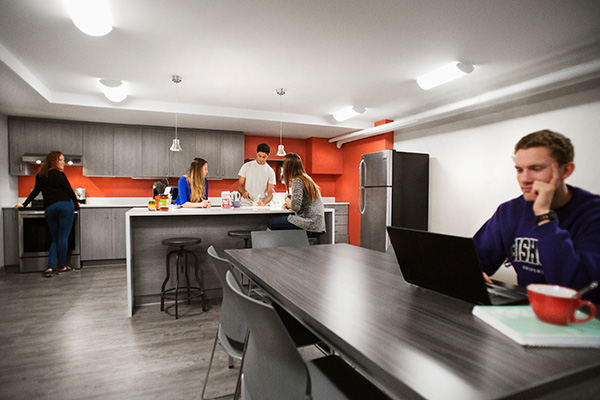 Students sharing a kitchen in Abbott building.