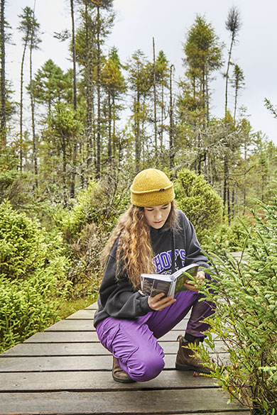 Student doing field research on our campus.