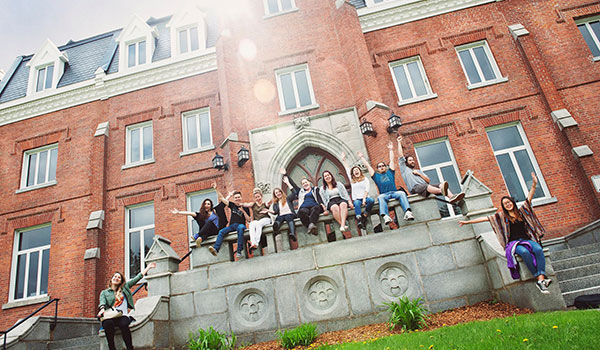 Students in front of McGreer during the summer