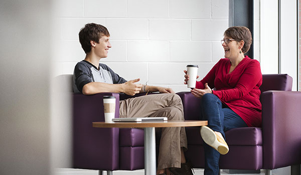 A teacher and a student having a discussion